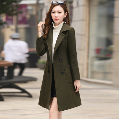 The vintage windbreaker pulls in the knee-length tweed coat